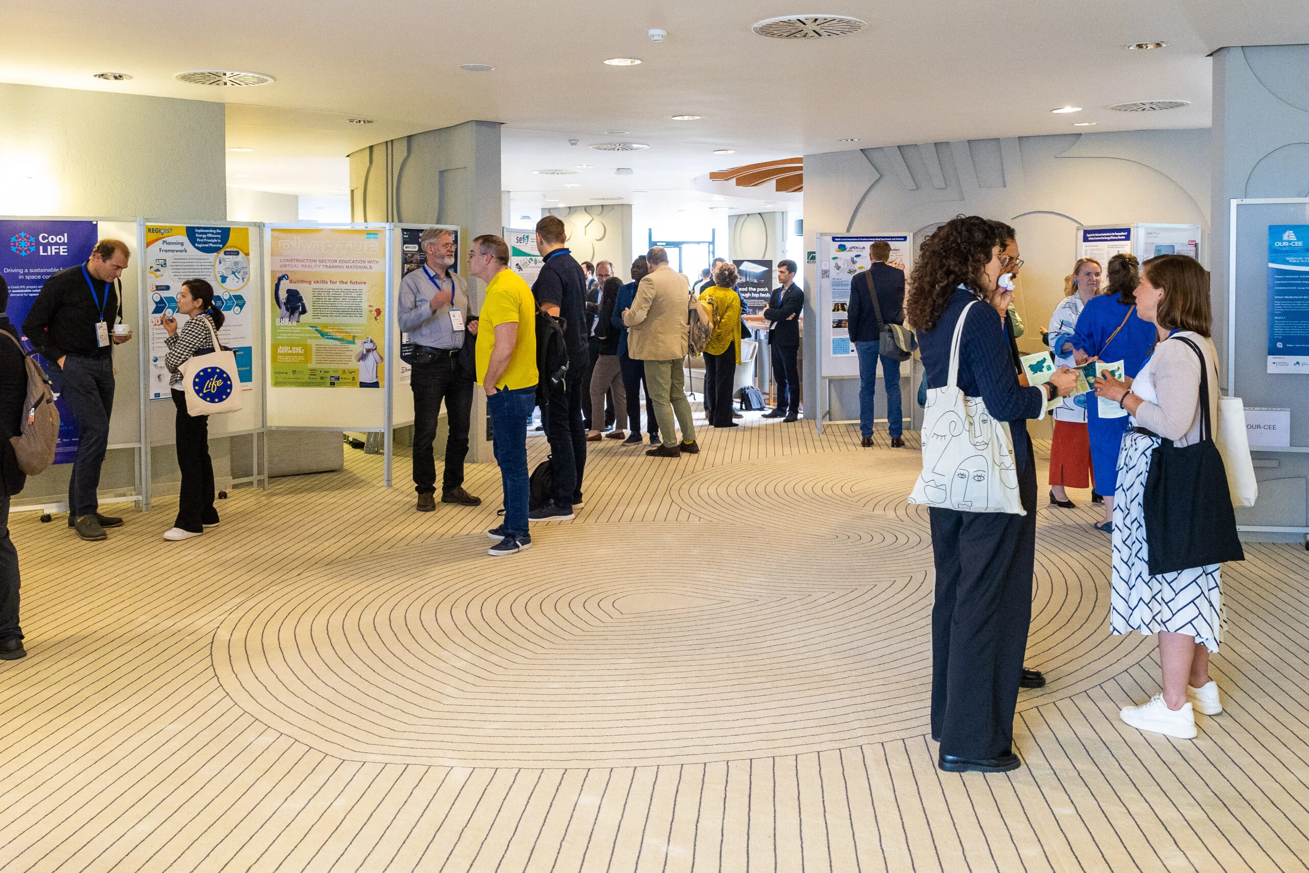 Project banners and posters on display at the C4E Forum 2025 Knowledge Hub